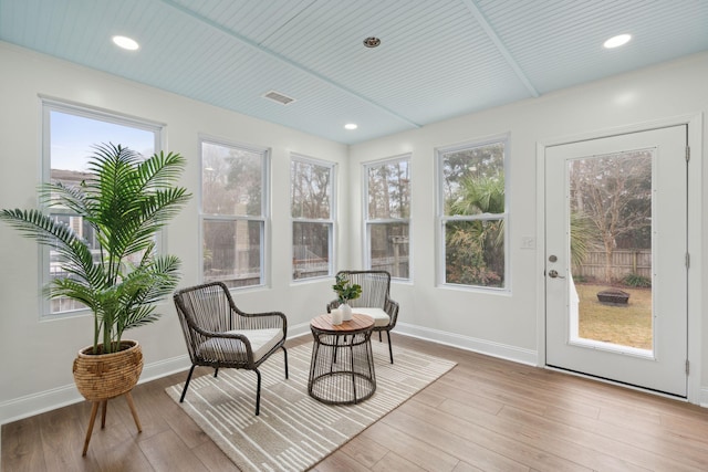 sunroom with plenty of natural light