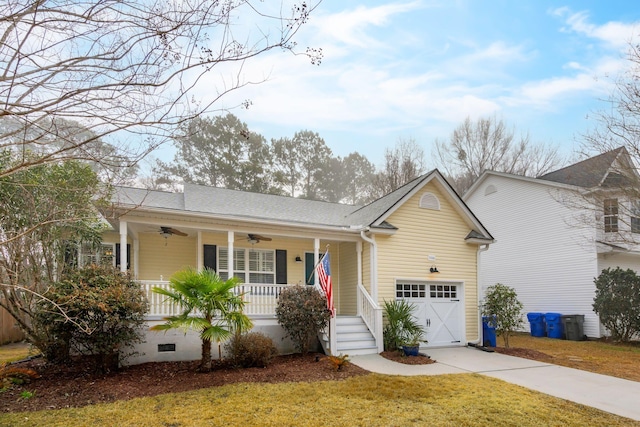 ranch-style house featuring a garage, a front lawn, ceiling fan, and covered porch