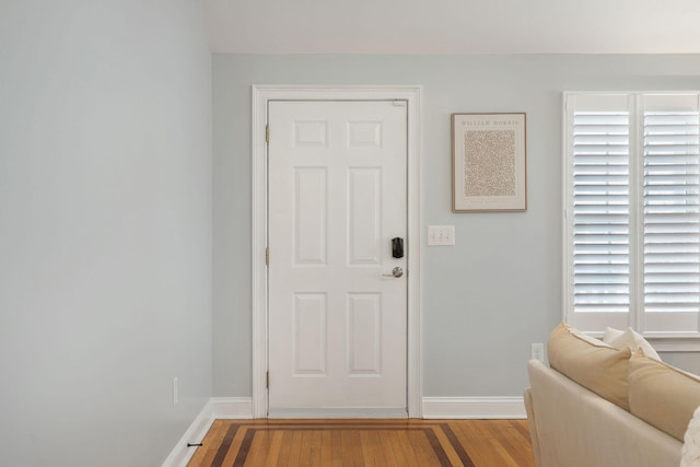 doorway to outside with light hardwood / wood-style floors