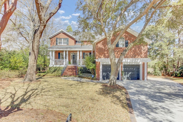 view of front of property featuring driveway, an attached garage, covered porch, stairs, and brick siding