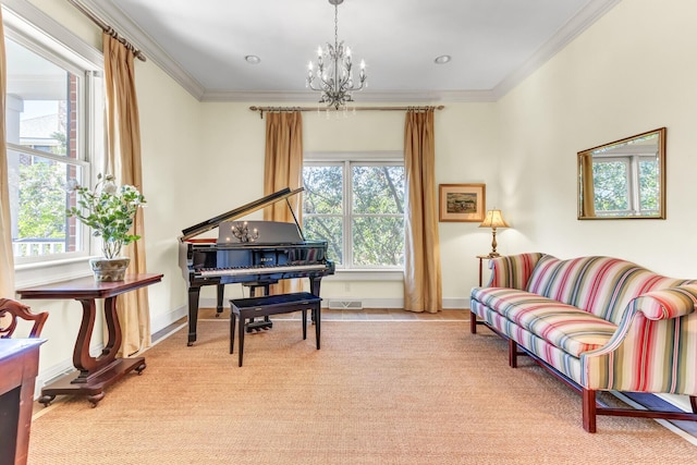 sitting room featuring a notable chandelier, visible vents, crown molding, and baseboards