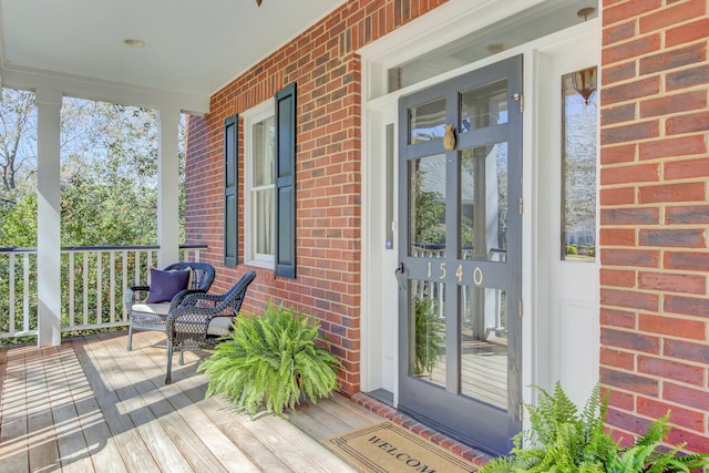 wooden deck featuring a porch