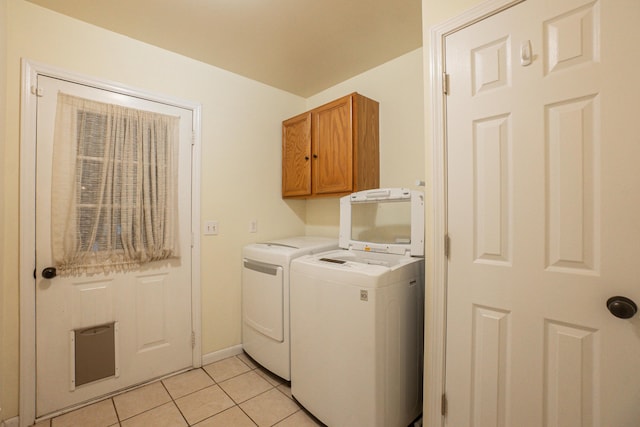 6427 Quimby Rd, Dalzell, SC 29040 - washroom with separate washer and dryer, cabinet space, and light tile patterned floors