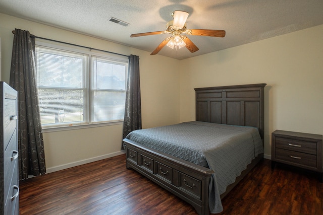 6427 Quimby Rd, Dalzell, SC 29040 - bedroom featuring dark wood-style floors, baseboards, and a ceiling fan