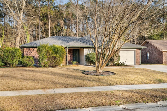 single story home with brick siding, an attached garage, driveway, and a front lawn