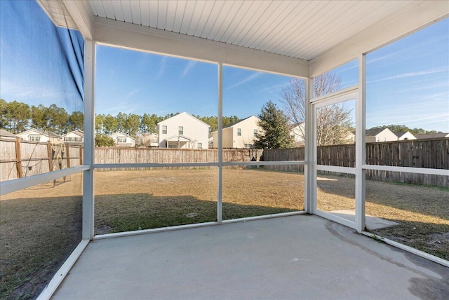 unfurnished sunroom with plenty of natural light