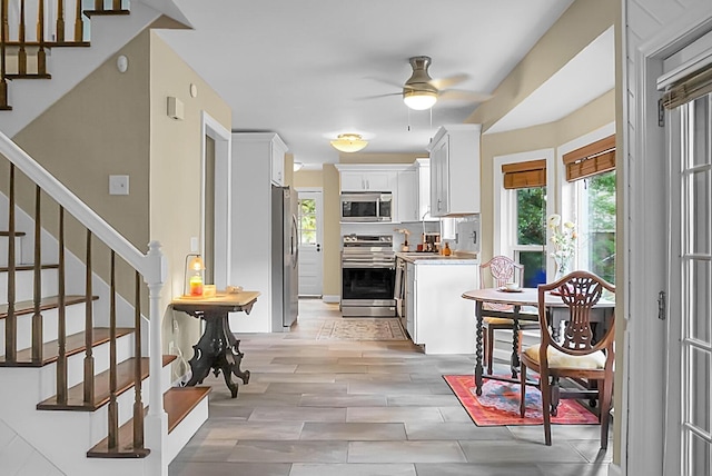 49 Crosscreek Dr, Charleston, SC 29412 - kitchen featuring appliances with stainless steel finishes, plenty of natural light, ceiling fan, and light countertops