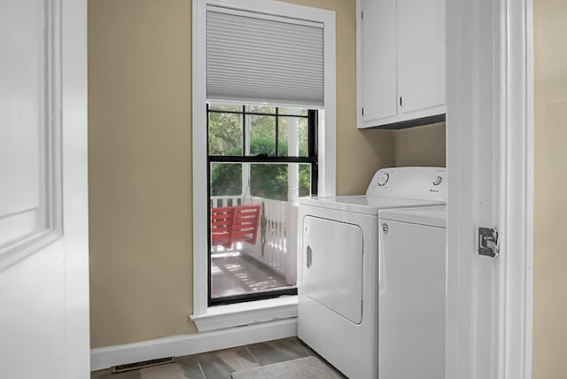 49 Crosscreek Dr, Charleston, SC 29412 - laundry room with cabinet space, washer and clothes dryer, and baseboards