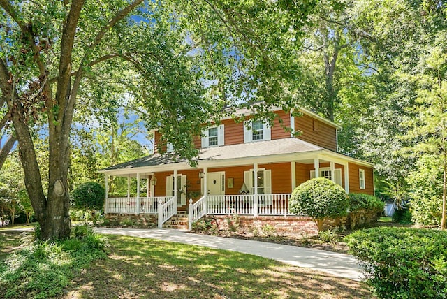 49 Crosscreek Dr, Charleston, SC 29412 - farmhouse-style home with a porch