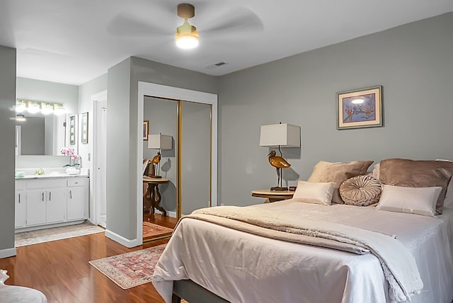 49 Crosscreek Dr, Charleston, SC 29412 - bedroom with a sink, wood finished floors, a closet, ensuite bathroom, and a ceiling fan