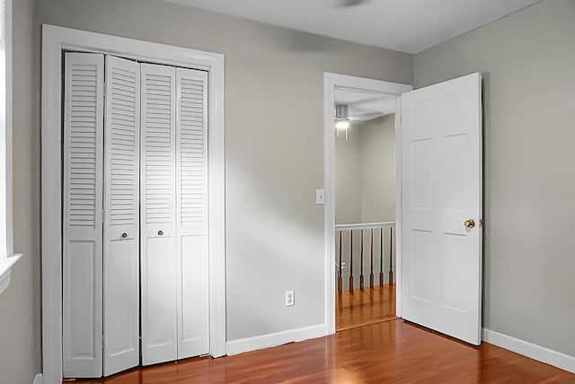 49 Crosscreek Dr, Charleston, SC 29412 - unfurnished bedroom with wood finished floors, a closet, and baseboards