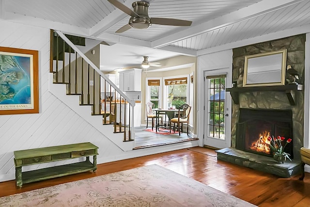 49 Crosscreek Dr, Charleston, SC 29412 - interior space with ceiling fan, wood finished floors, a fireplace, wood walls, and wood ceiling with exposed beams