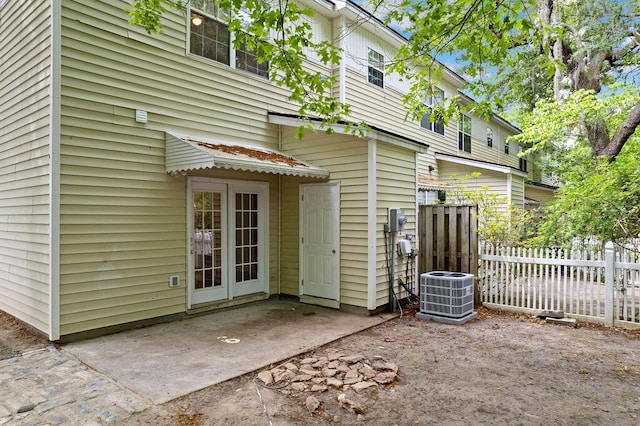 4591 Great Oak Dr, North Charleston, SC 29418 - back of house featuring a patio, central AC, and fence
