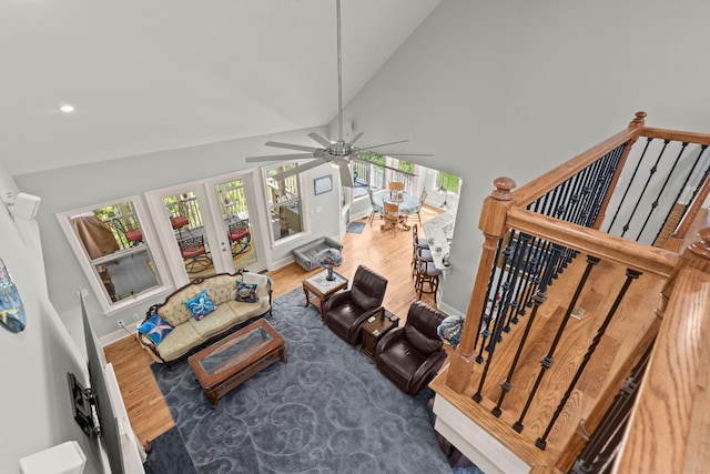 8605 Refuge Point Cir N, Charleston, SC 29420 - living room with french doors, a ceiling fan, wood finished floors, high vaulted ceiling, and baseboards
