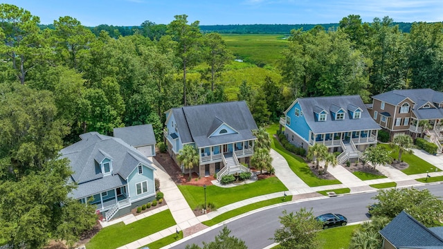 8605 Refuge Point Cir N, Charleston, SC 29420 - aerial perspective of suburban area with a forest