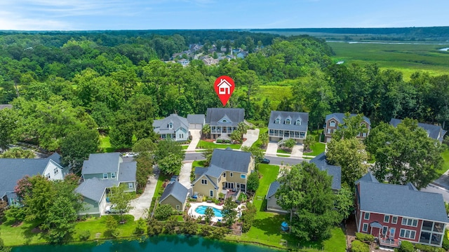 8605 Refuge Point Cir N, Charleston, SC 29420 - aerial perspective of suburban area with a forest and a pool
