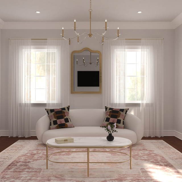 sitting room with baseboards, recessed lighting, and wood finished floors