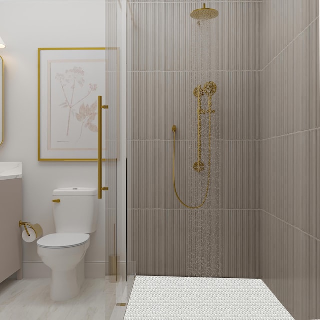 full bathroom featuring vanity, toilet, and tiled shower