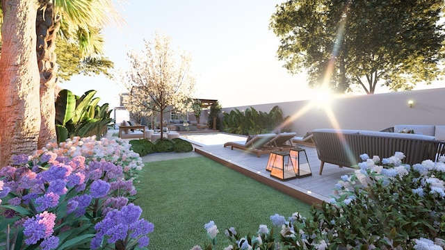 view of yard featuring a deck and an outdoor living space