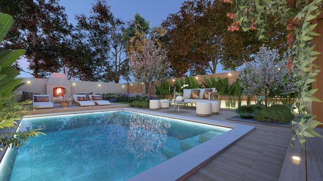 view of swimming pool with a fenced backyard, a deck, and a fenced in pool