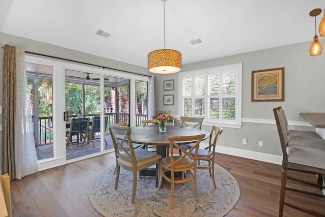 dining room featuring dark hardwood / wood-style floors