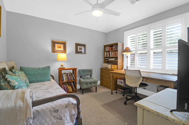 interior space featuring carpet flooring and ceiling fan