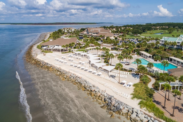 birds eye view of property featuring a water view and a view of the beach