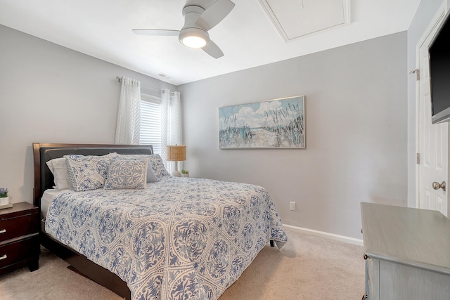 bedroom featuring ceiling fan and light carpet