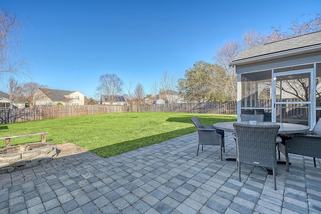 view of patio / terrace with a sunroom