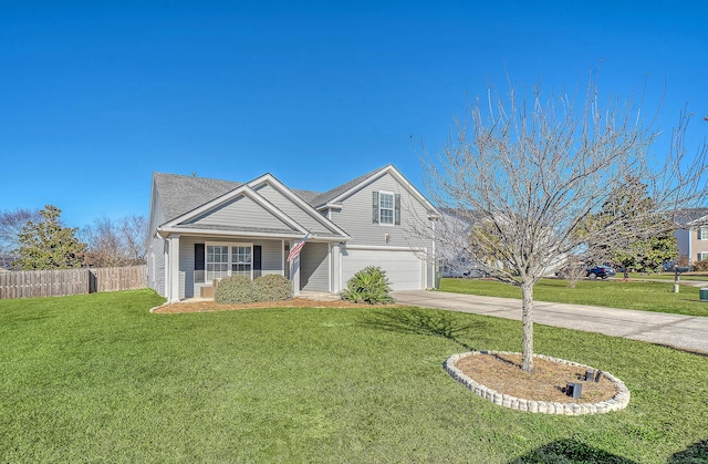 view of front of house with a garage and a front lawn