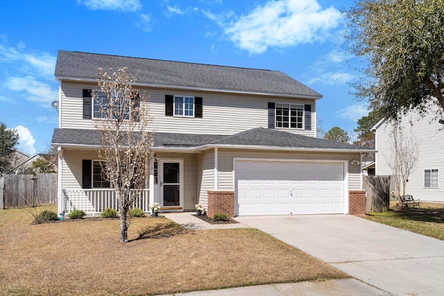 traditional home featuring brick siding, covered porch, concrete driveway, and fence