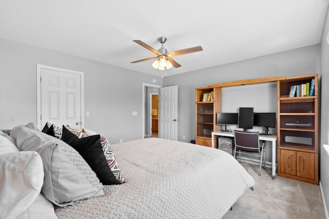 bedroom featuring ceiling fan and carpet flooring