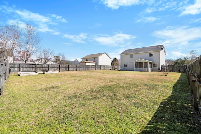 view of yard with a fenced backyard