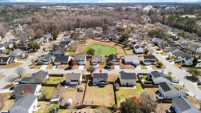 birds eye view of property featuring a residential view and a water view