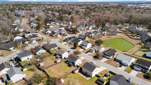 aerial view featuring a residential view and a water view