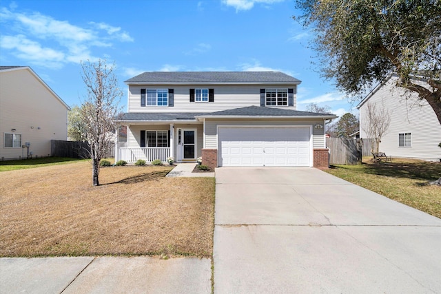 traditional-style house featuring brick siding, covered porch, a front yard, and fence