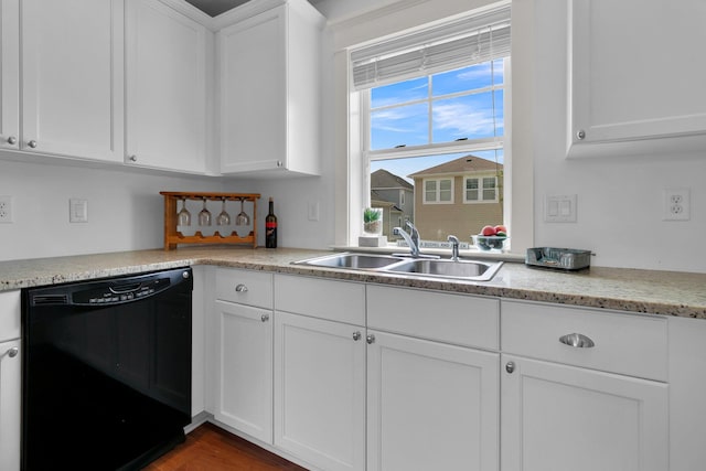 2405 Louisville St, Charleston, SC 29492 - kitchen with wood finished floors, dishwasher, a sink, and white cabinetry