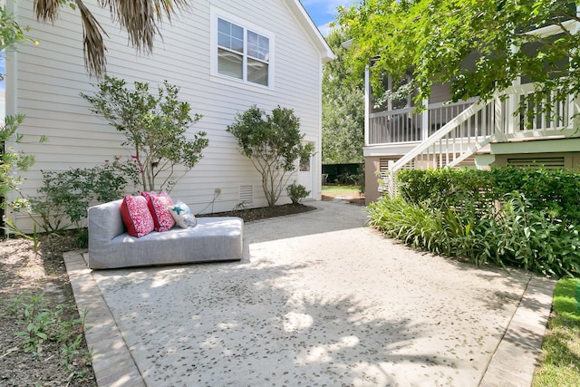 2405 Louisville St, Charleston, SC 29492 - view of property exterior with a patio area and stairway