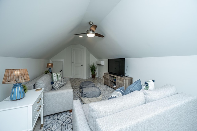 living room featuring a ceiling fan, a wall mounted AC, and lofted ceiling