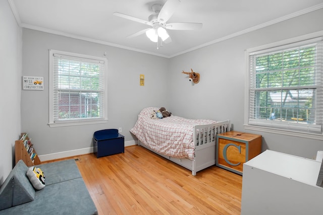 113 Overhill Dr, Walterboro, SC 29488 - bedroom featuring light wood-type flooring, crown molding, baseboards, and ceiling fan
