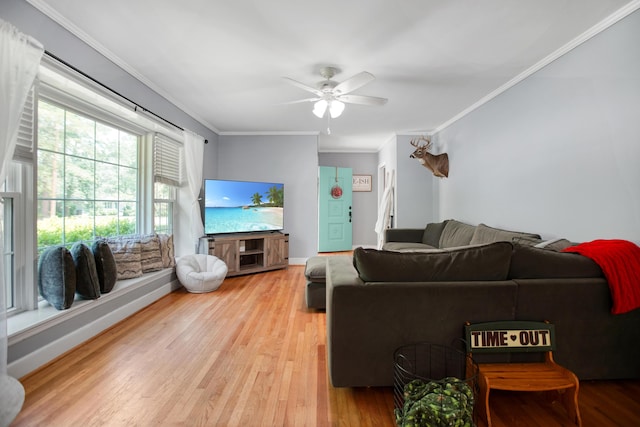 113 Overhill Dr, Walterboro, SC 29488 - living area with crown molding, light wood finished floors, ceiling fan, and baseboards
