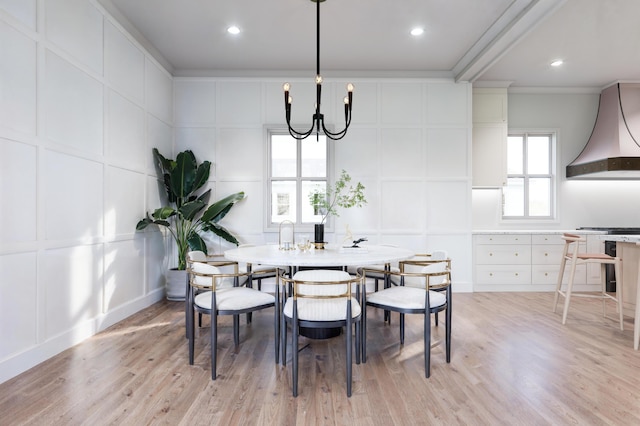 814 Palm Blvd, Isle Of Palms, SC 29451 - dining room with a decorative wall, a chandelier, light wood-type flooring, and recessed lighting