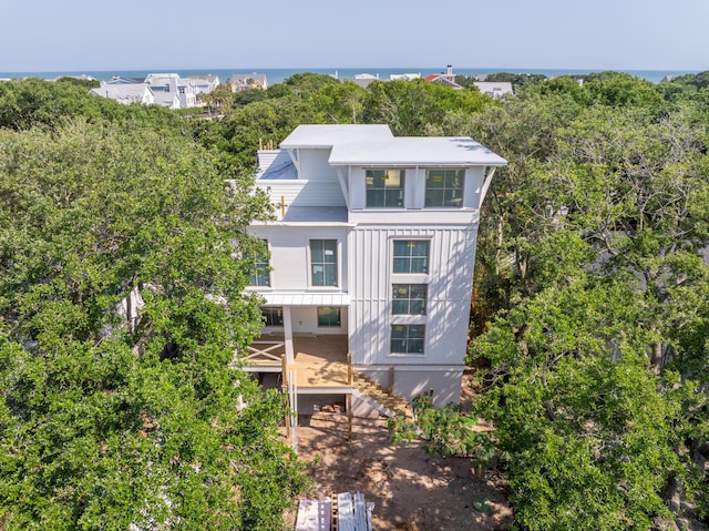 814 Palm Blvd, Isle Of Palms, SC 29451 - view of front of house with stairway and a water view