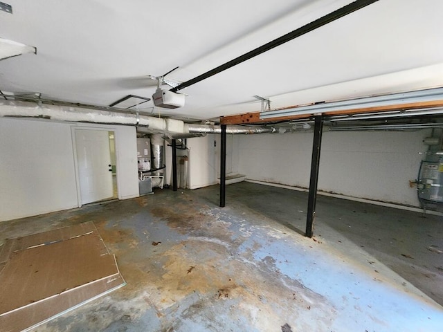 garage with secured water heater and a garage door opener