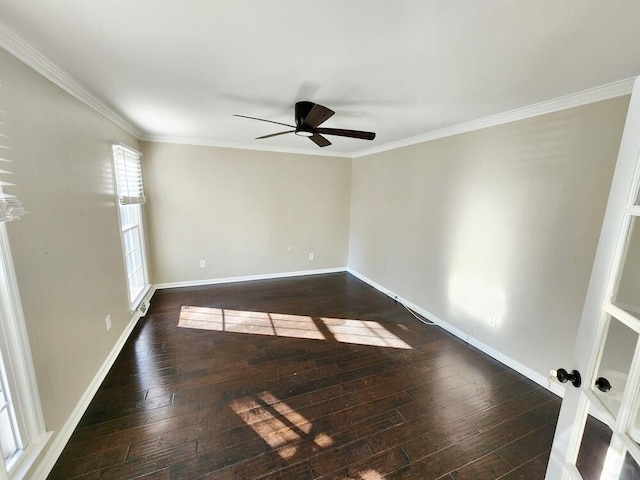 spare room with dark hardwood / wood-style floors, ceiling fan, and crown molding