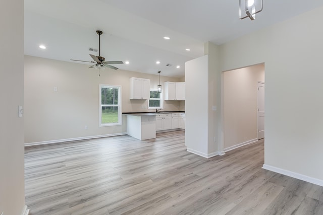 306 S Magnolia Ave, Andrews, SC 29510 - unfurnished living room with a ceiling fan, light wood finished floors, a sink, recessed lighting, and baseboards