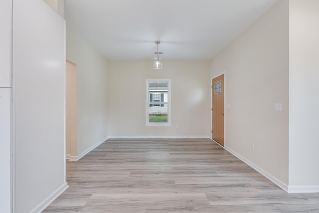 306 S Magnolia Ave, Andrews, SC 29510 - unfurnished dining area featuring light wood-style floors and baseboards