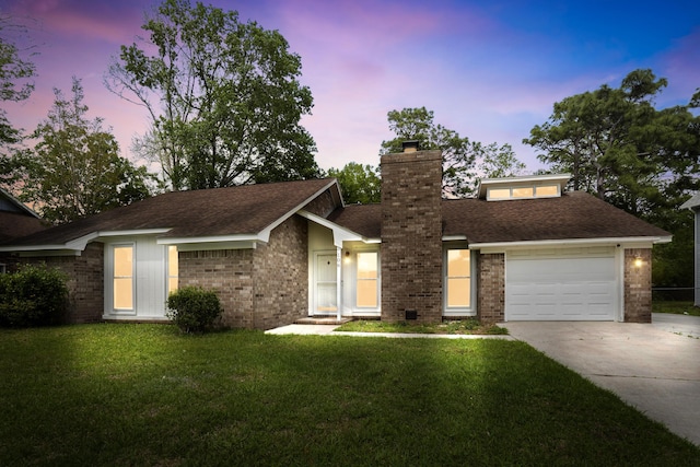 106 Ruffin Rd, Summerville, SC 29486 - view of front of house featuring a chimney, brick siding, a front lawn, driveway, and roof with shingles