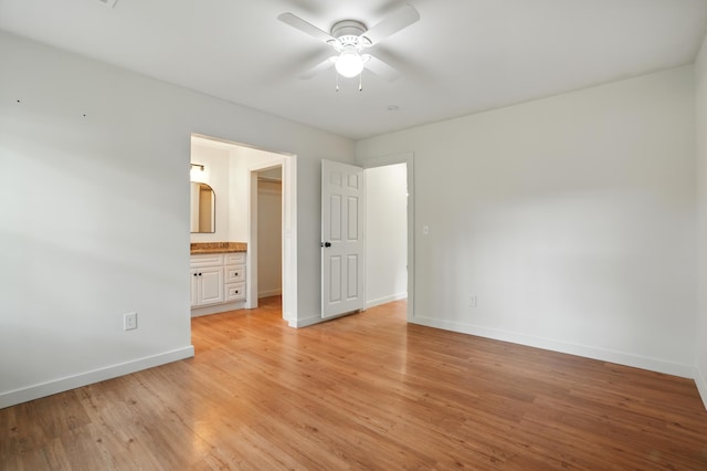 106 Ruffin Rd, Summerville, SC 29486 - unfurnished bedroom featuring baseboards, a spacious closet, ceiling fan, light wood-style floors, and connected bathroom