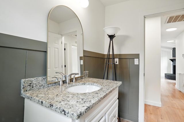 106 Ruffin Rd, Summerville, SC 29486 - bathroom featuring vanity, visible vents, and wood finished floors